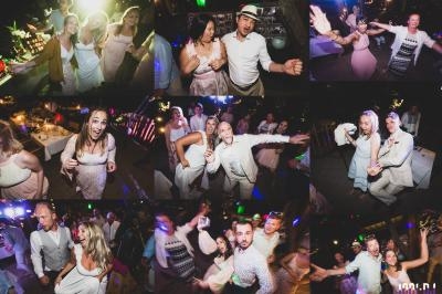 Personnes dansant et s'amusant lors d'une fête animée avec éclairages colorés et ambiance festive.